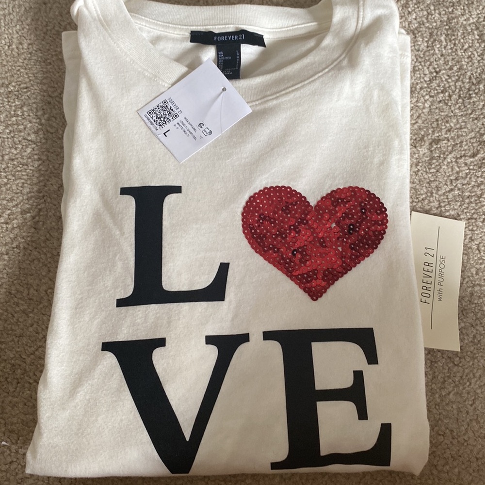 ❤️ White t-shirt made with a red ♥️ 💯 percent soft cotton!